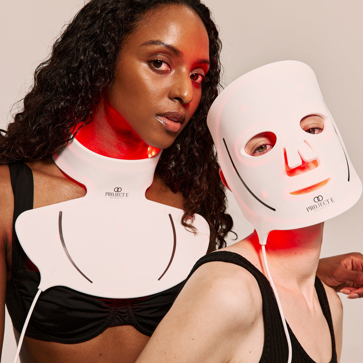 Women boosting collagen with at-home red light LED masks
